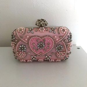 Pink pearls and jewels clutch